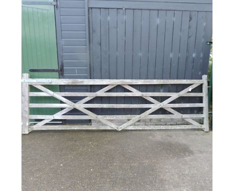 A wooden five bar gate, 370cm