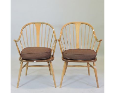 A pair of 1970's Ercol 'cowhorn' armchairs, No.514