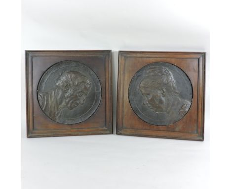 A pair of Victorian portrait plaques, 25cm diameter, in oak frames