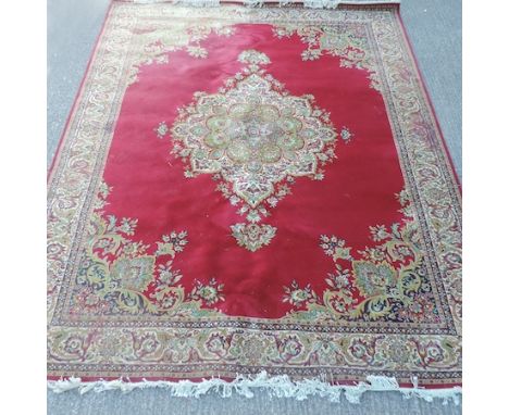 A large Persian carpet, 465 x 368cm, together with another smaller