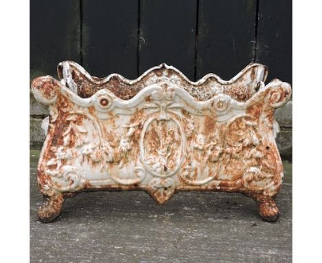 A white painted cast iron planter, 48 x 26cm