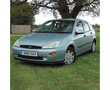 A Ford Focus, green, 1.8 litre, 1998, 5 door, manual gearbox, with MOT, S601 XAV