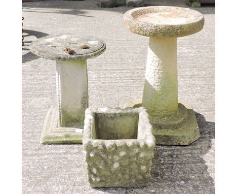 A stone sundial, 33cm tall, together with a planter and a birdbath 