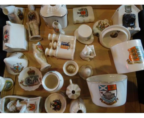 A quantity of crested china, to include examples by Shelley, W. H. Goss, Carlton china, Arcadian ware and others.