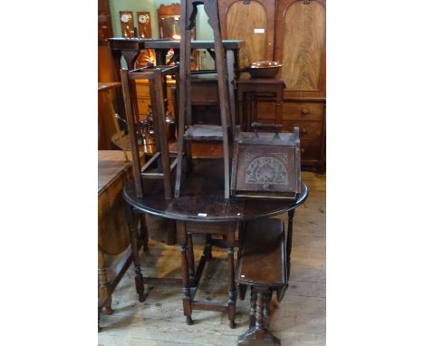 A small oval gate leg table, together with a stick stand, tall plant stand, a Victorian mahogany coal box and an oak drop-lea