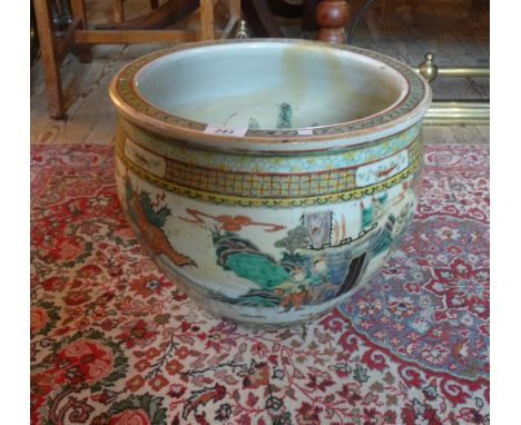 A 20th century Japanese jardiniere of imposing proportions, decorated to the interior with goldfish and to the exterior with 