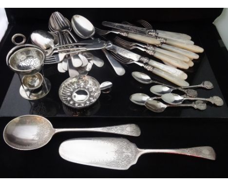 A set of mother of pear and silver knives and forks, together with a quantity of silver plated flatware.