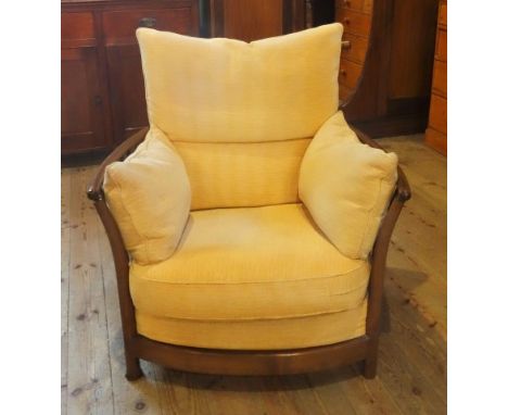 A large ercol-style easy chair, 84cm wide.