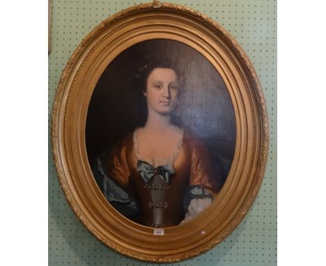Nineteenth century English school, portrait of a smartly dressed lady oil on canvas, unsigned, 73cm x 56cm in an oval gilt fr