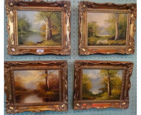 A set of four forest and river scenes, oil on canvas, two monogrammed J. K., the other two indistinctly signed, each 19cm x 2