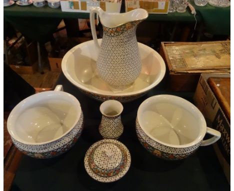 A Myott & Sons ceramic bedroom set, comprising: large wash bowl and jug, two gazunders, a dressing table jar and lidded pot, 