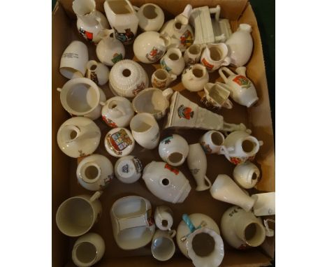 A large quantity of crested china, the majority produced by W. H. Goss.
