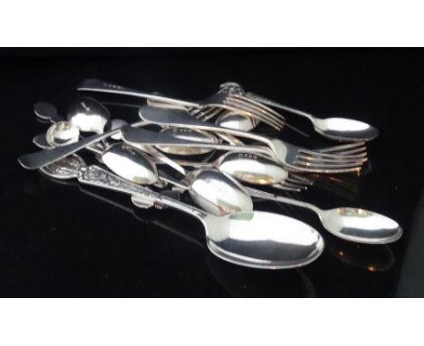 A large early 20th century Elkington & Co. decorated silver spoon, together with a quantity of other silver flatware.