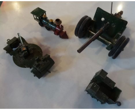 A small quantity of die cast vehicles to include: Matchbox Models of Yesteryear steam engine, a Dinky military gun and a scra