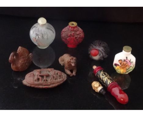 A quantity of collector's items, to include: a Chinese Cinnabar lacquered snuff bottle, three other Oriental bottles, a Japan