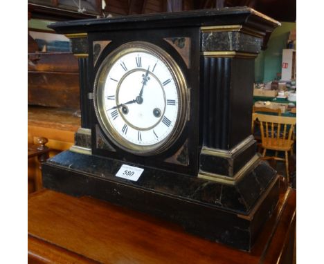 A 20th century wooden cased slate effect mantle clock, the enamel dial bearing Roman numerals and marked Junghans, 32.5cm wid