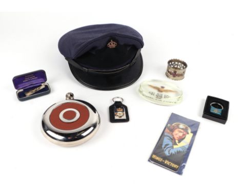 A 1978 civil airlines Pilots cap together with an assortment of RAF  memorabilia including a hip flask, paper weight, keyring