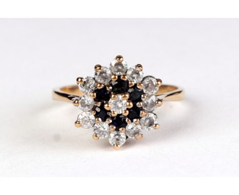 A 9ct gold sapphire and white stone cluster ring, approx UK size O, 3.3g.