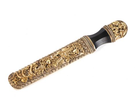 A Bhutanese or Tibetan knife (Dozun), the scabbard decorated with a mythical demon and dragons with similar terminal to the h