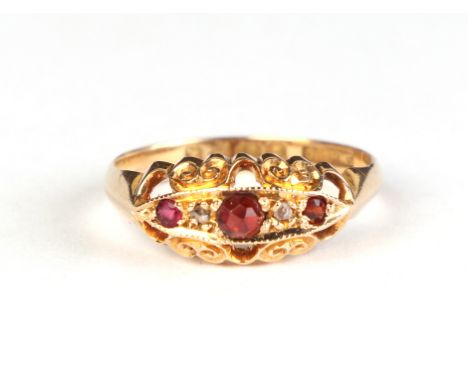 An 18ct gold ruby and diamond gypsy style ring, approx UK size N, 2.8g.