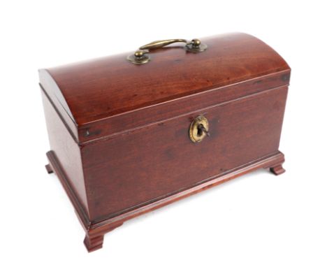 A 19th century mahogany dome topped tea caddy on bracket feet, 24cms wide.