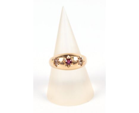 An 18ct gold, ruby and diamond gypsy ring, approx UK size L, 3.8g