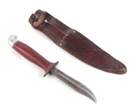 A 1937 Boy Scout jamboree sheath knife and scabbard, the blade etched 'made in Finland' 19cm long