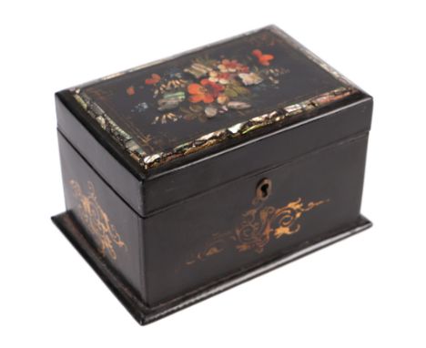 A Victorian papier-mâché tea caddy with gilt painted flora and mother of pearl inlaid decoration, 17cms wide.Condition Report