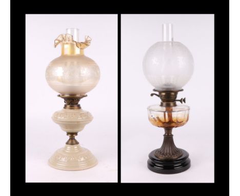 A Victorian oil lamp; together with a creamware oil lamp (2).Condition ReportBoth of the lamps appear to be in good condition
