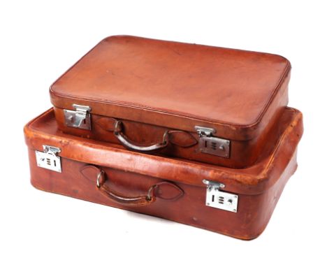 Two vintage Harrods leather suitcases with combination locks, 66cms and 57cms wide (2).