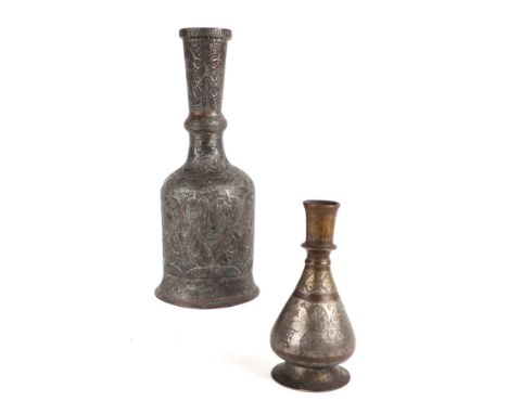 A tinned copper hookah pipe base, 32cms high; together with another similar, 20cms high (2).