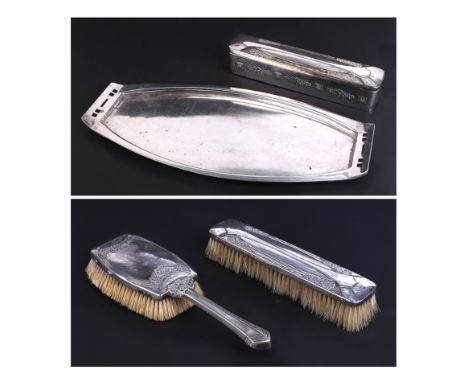 A Secessionist design silver plated four-piece dressing table set to include tray, brushes and trinket box.