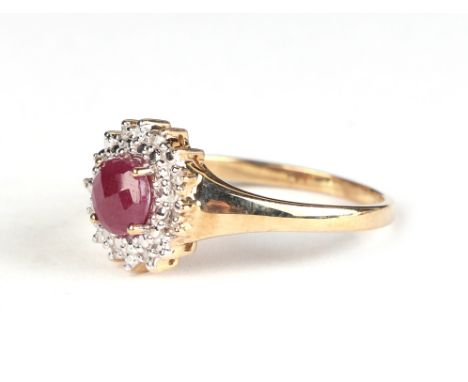 A 9ct gold ruby and diamond cluster ring, approx UK size T, 3g.