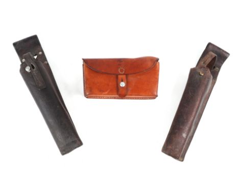 Swiss Army leather ammunition pouch or cartridge case 21.5cms (8.5ins) wide, stamped to the reverse: WS BRUGGER 65, together 