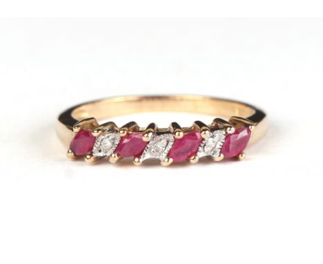 A yellow metal seven stone ruby and diamond ring, approx UK size P, 2.4g.