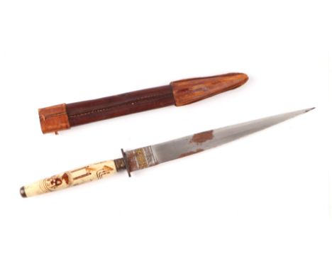 An Art Nouveau steel bladed dagger in leather scabbard, overall 28cms, blade length 18cms.