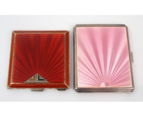 A silver and enamel compact by Henry Clifford Davis, Birmingham 1949, of square form with engine turned decoration, the hinge