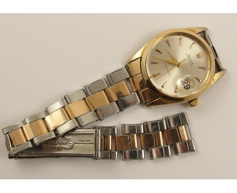 A Vintage 1965 bi colour stainless steel Rolex Oyster Date precision the gold plated head has a champagne dial with gold colo