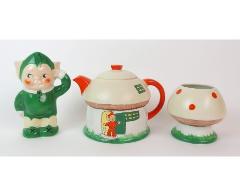 A Shelley three-piece enamelled porcelain "Boo Boo" tea set, designed by Mabel Lucie Atwell circa 1930, comprising a house-fo