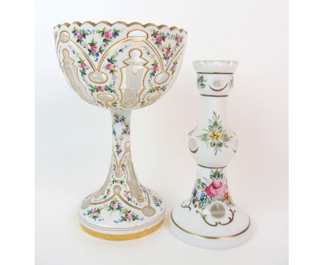 A Focke & Metzler Dutch enamelled glass candlestick and enamelled glass footed bowl both with white overlay exposing clear gl