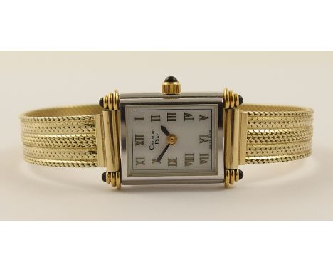A 14ct Christian Dior watch with gem set detail to the terminal points of the bezel and the winder, white face with printed g