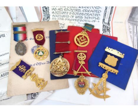 An important group of Masonic medals awarded to Brother James Stewart An 18ct gold and diamond set compass and square medal w