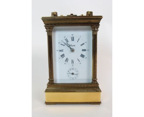 A French two-dial brass carriage clock modern, hour dial with Roman numerals, smaller dial with Arabic numerals, marked "Ange