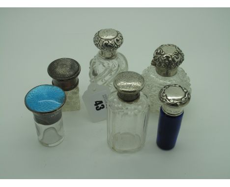 Assorted Hallmarked Silver Topped Glass Bottles, (various makers/dates), including turquoise enamel, a globular scent bottle 