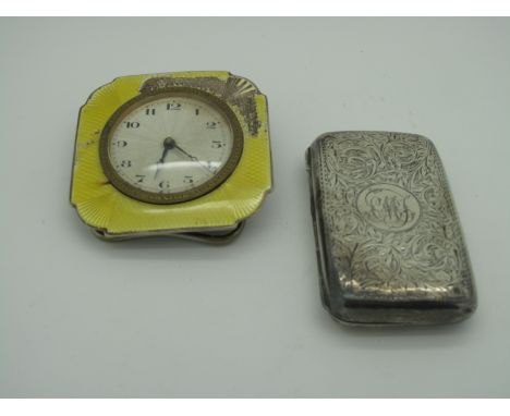 A Hallmarked Silver and Yellow Enamel Bedside Clock, the circular dial (marked "France") with Arabic numerals, within shaped 