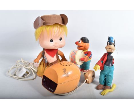 A LINEA ZERO BOBBLE HEAD LAMP, modelled as a boy dressed as a Cowboy, not tested, appears complete but has some discolouratio