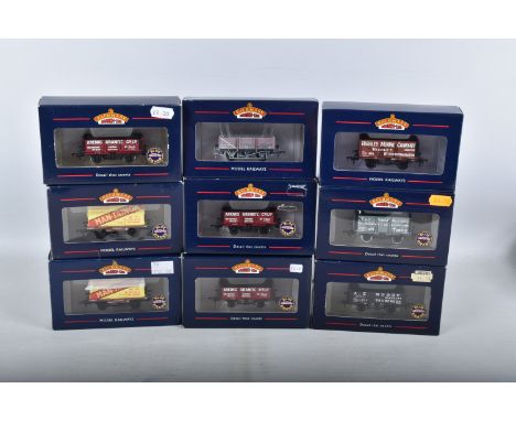 NINE BOXED OO GAUGE BACHMANN BRANCHLINE MODEL RAILWAY WAGONS, to include two Conflat BR Livery with Red &amp; Yellow , no. BD