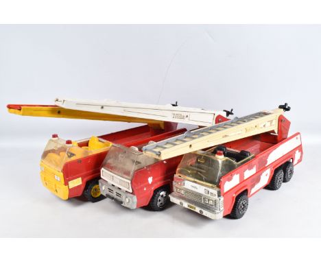 THREE UNBOXED PLAYWORN REGULAR TONKA TOYS FIRE TRUCKS, all complete with turntable and extending ladder, all moveable parts n