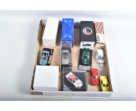 FOUR BOXED TRIUMPH TR7 AND TR8 SPORTS CAR MODELS, all 1/43 white metal kits that have been constructed and finished to a very