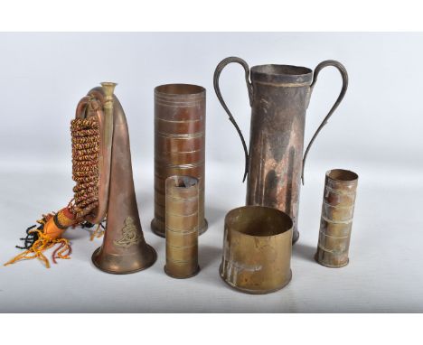 A COLLECTION OF WWI AND WWII BRASS TRENCH ART SHELLS AND BRASS BUGLE, the shells include a pair of 1941 dated 37mm/M16 shells